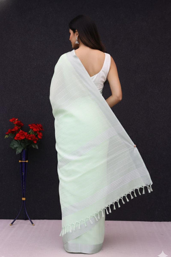 Elegant   Pure  heavy Linen-Cotton Saree with Silver Striped Border”