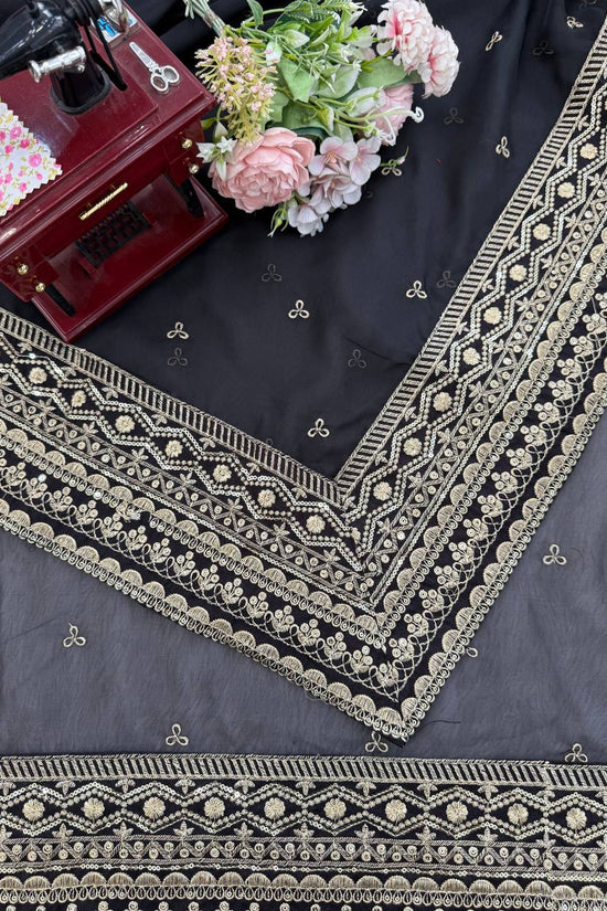 “Black Gold-Embroidered Festive Saree”