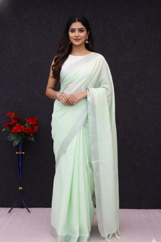 Elegant   Pure  heavy Linen-Cotton Saree with Silver Striped Border”