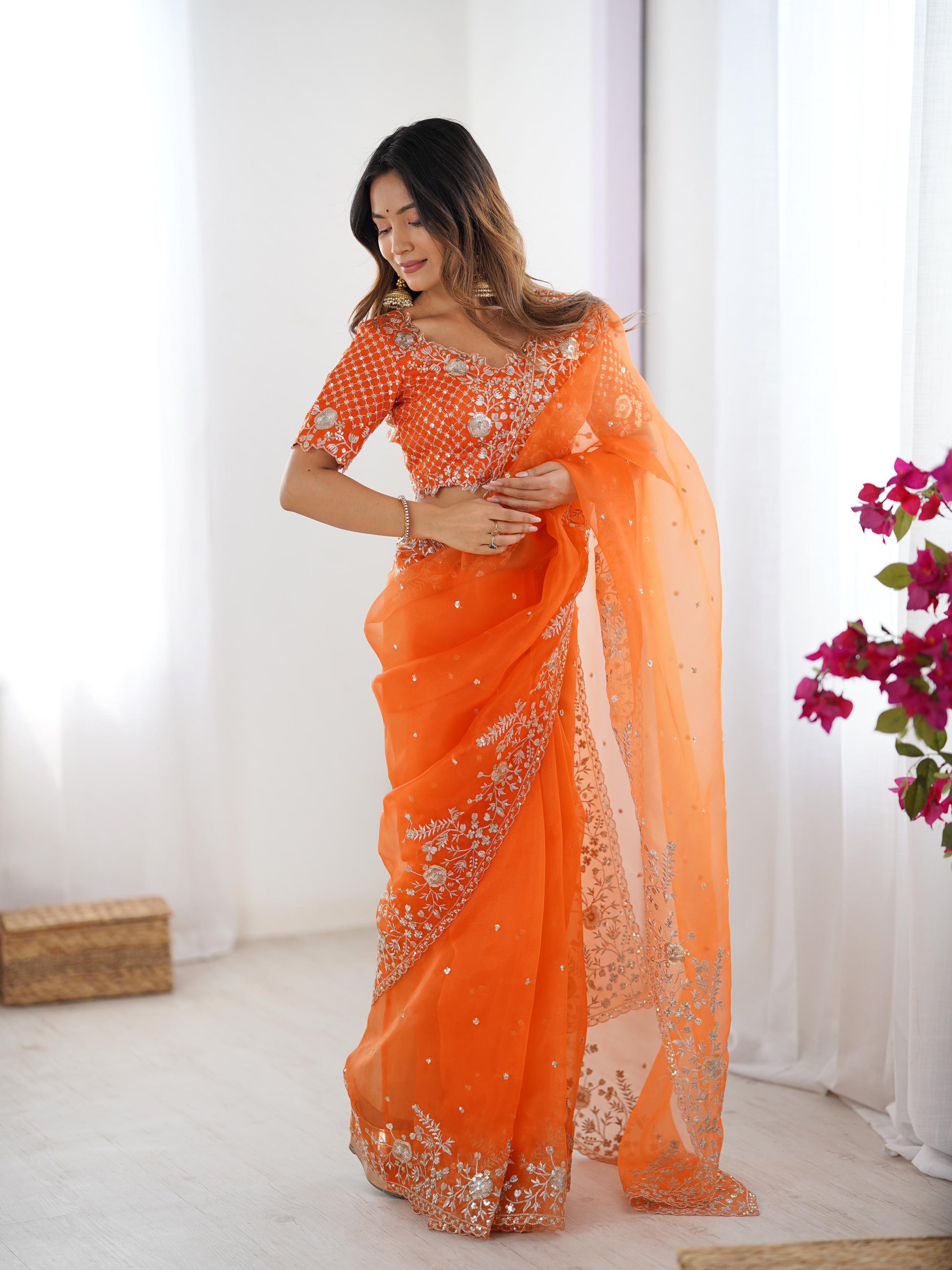 Festive Weeding Wear Orange Organza Saree with Silver Motifs