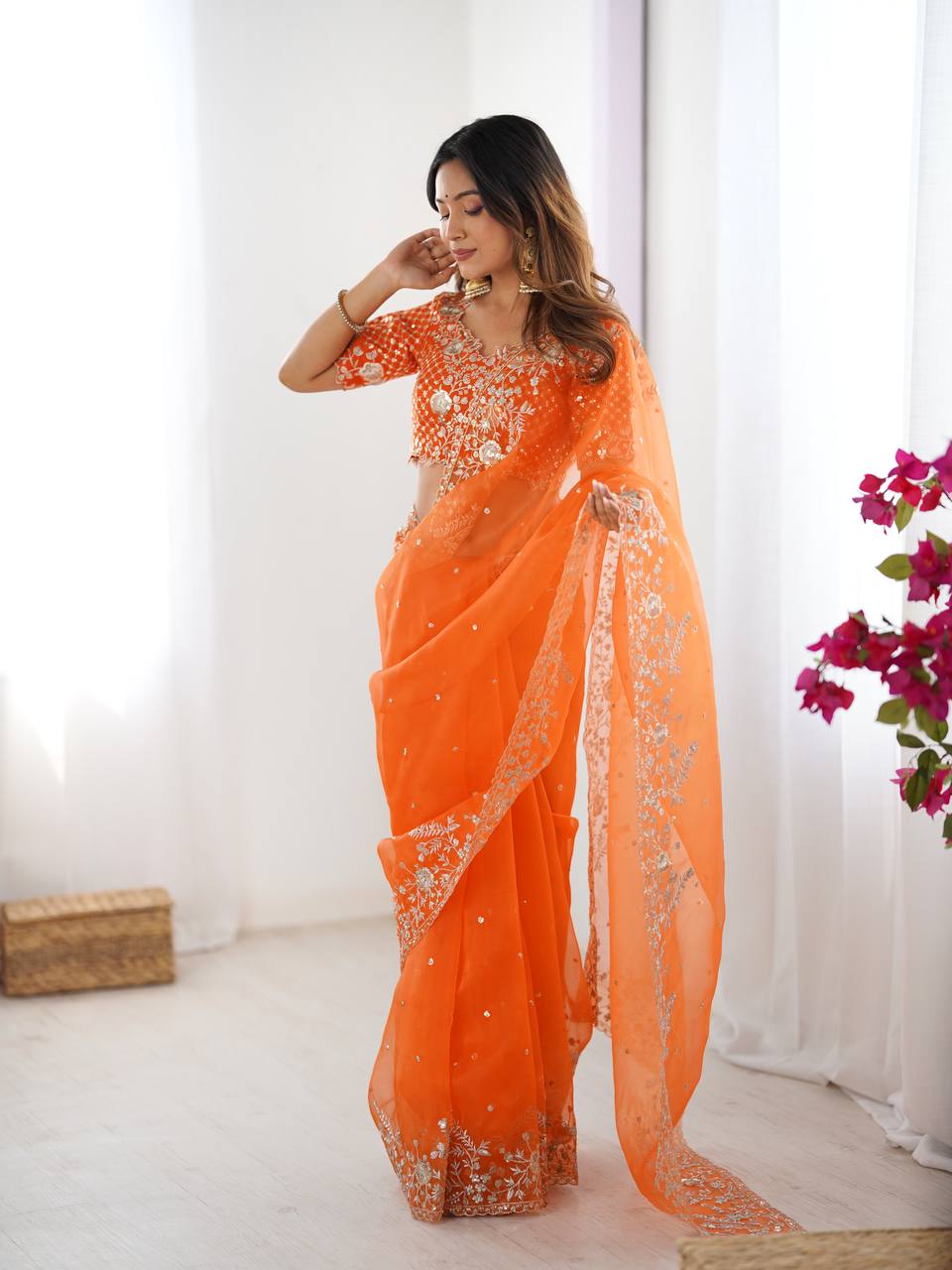 Festive Weeding Wear Orange Organza Saree with Silver Motifs