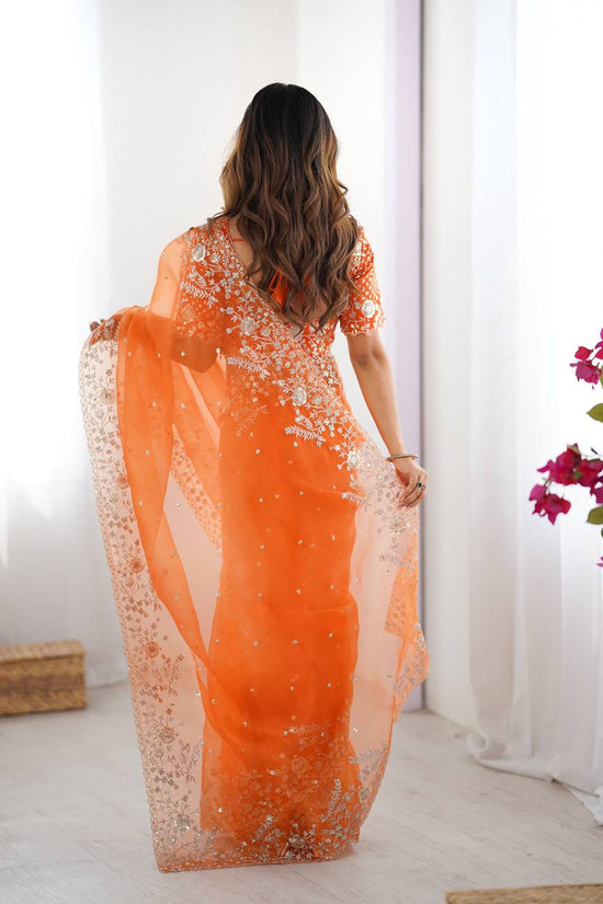 Festive Weeding Wear Orange Organza Saree with Silver Motifs