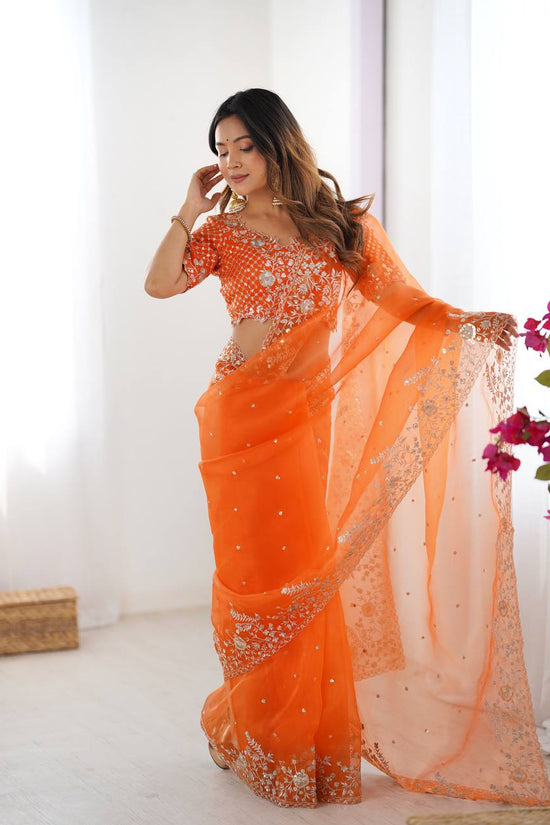 Festive Weeding Wear Orange Organza Saree with Silver Motifs