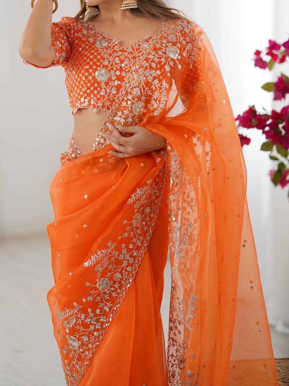 Festive Weeding Wear Orange Organza Saree with Silver Motifs