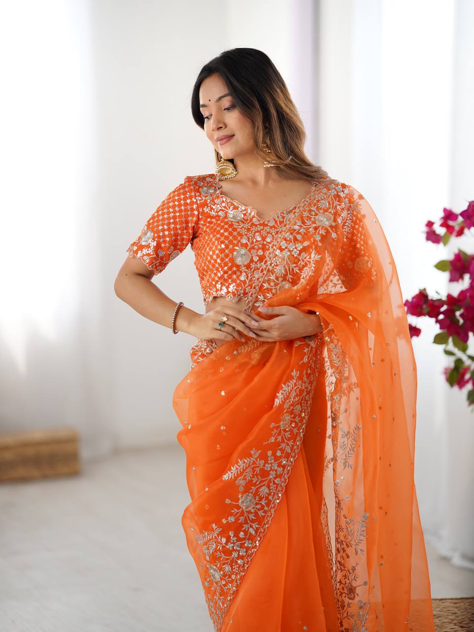 Festive Weeding Wear Orange Organza Saree with Silver Motifs