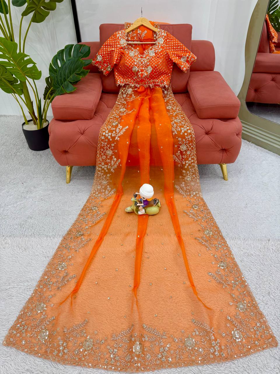 Festive Weeding Wear Orange Organza Saree with Silver Motifs