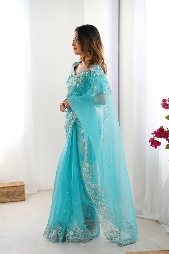 Festive Weeding Wear Orange Organza Saree with Silver Motifs