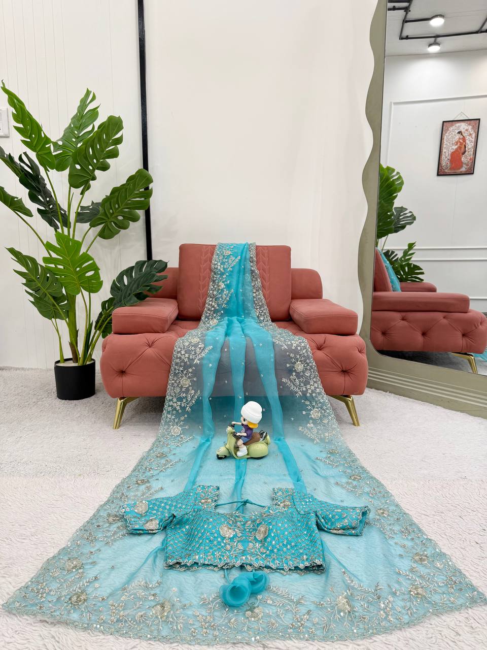 Festive Weeding Wear Orange Organza Saree with Silver Motifs