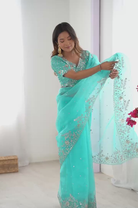 Festive Weeding Wear Orange Organza Saree with Silver Motifs